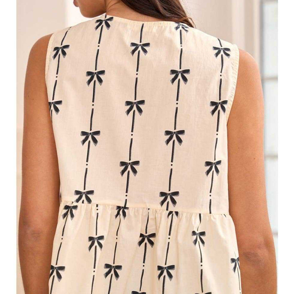 Mendi | Chic Sleeveless V-Neck Top with Bow Accent – Light and Stylish