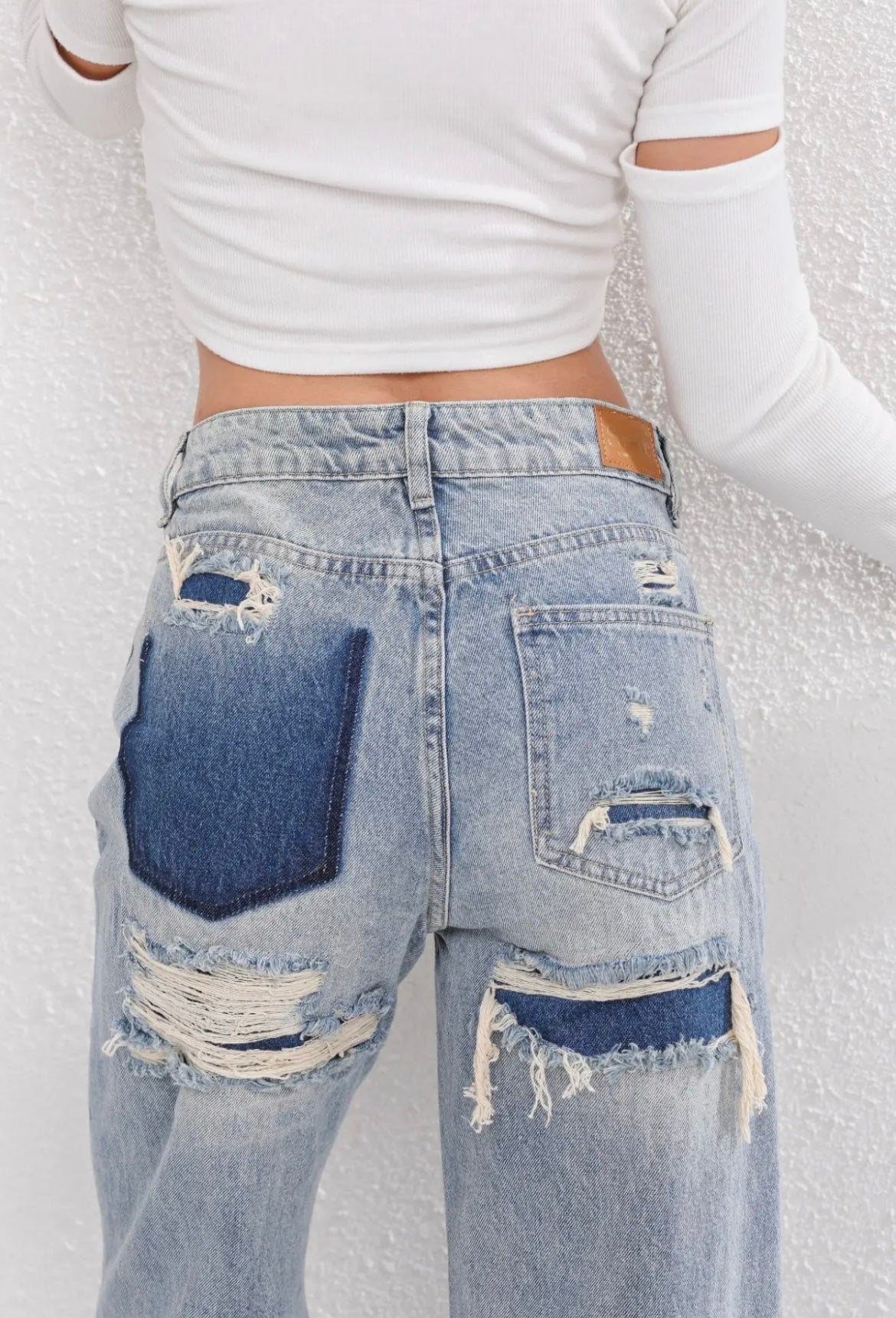 Burgina | Retro Distressed Jeans Featuring Distinctive Patchwork Accents