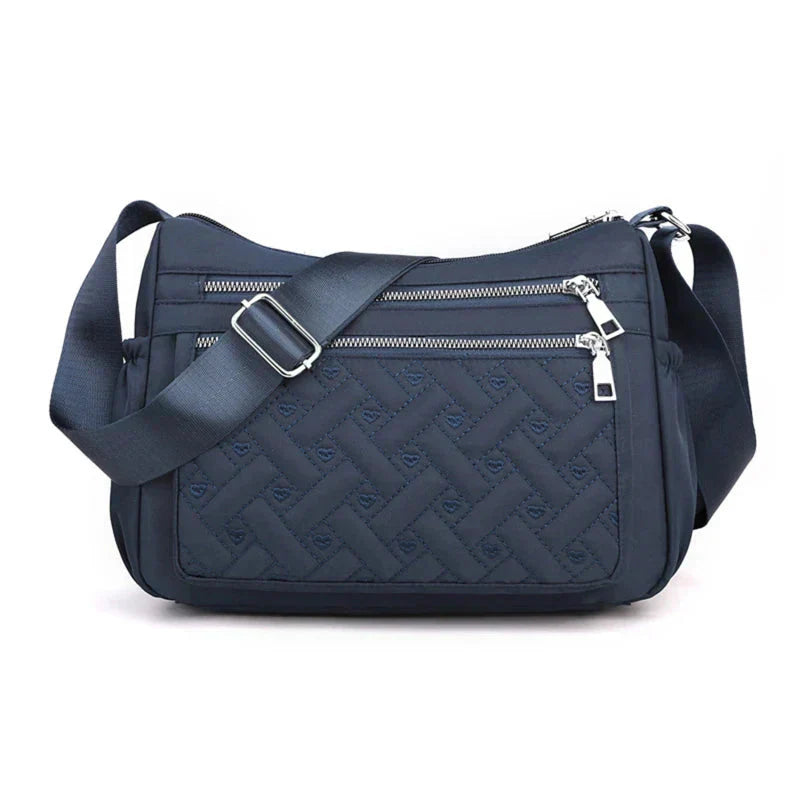 Noora™ | Nylon shoulder bag with messenger style