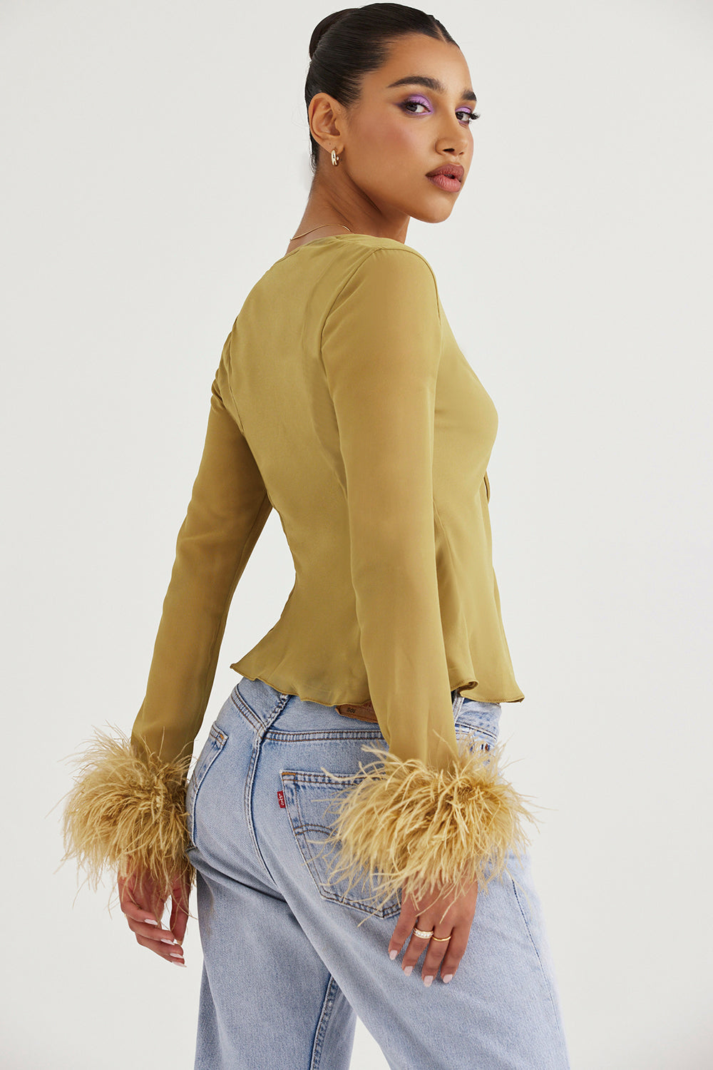 Chic V-Neck Top with Bow and Feather Details - Breezy Elegance